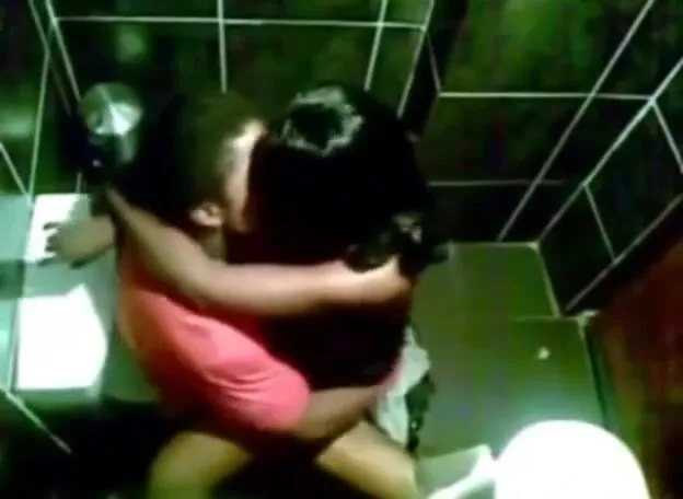 Guy fucking an African girl in the toilet and got caught pic